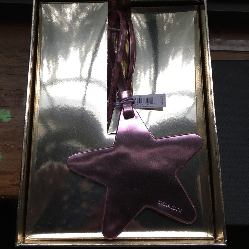 Coach Metallic Pink Star bag charm/ Tag